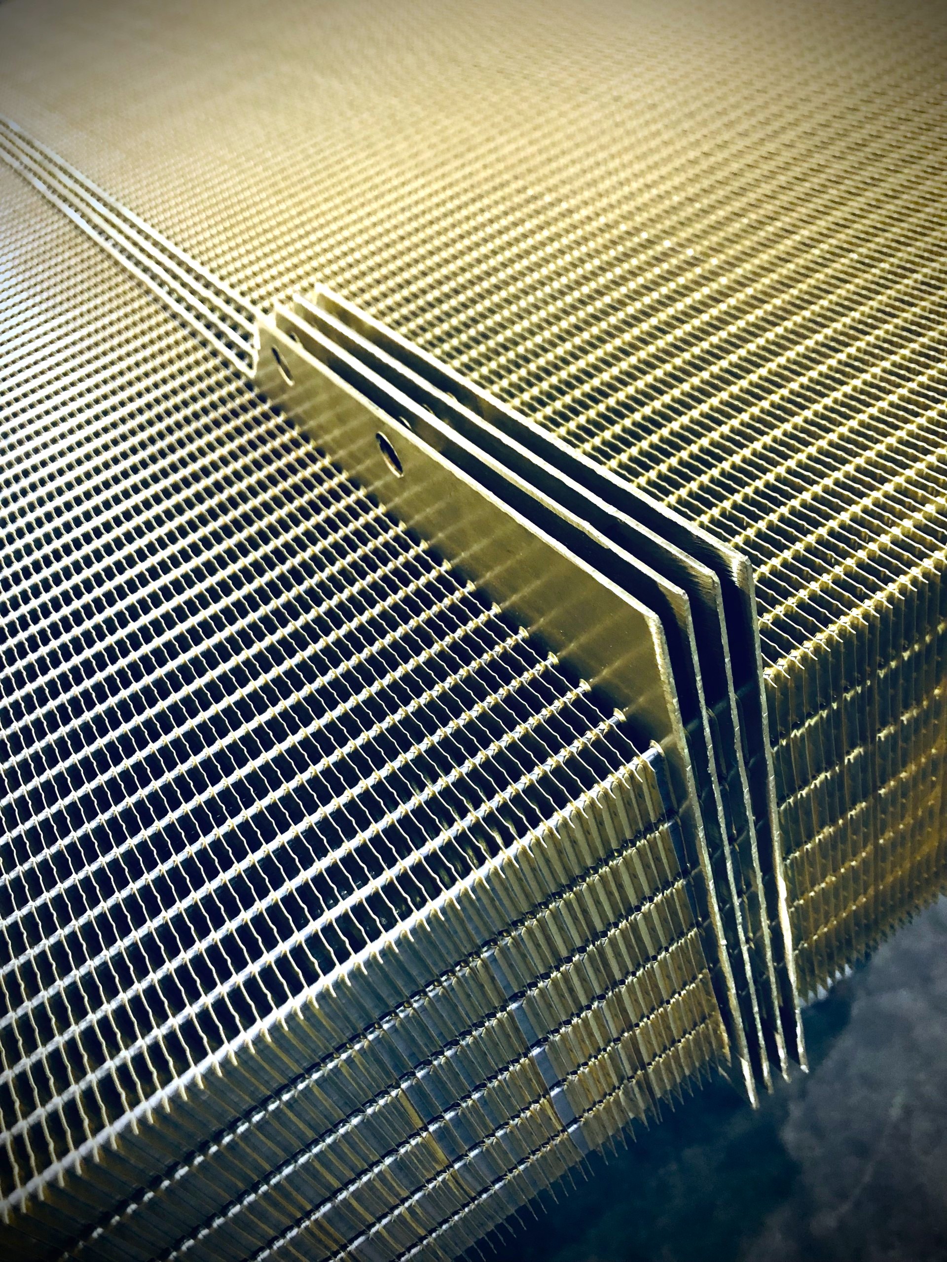 6 Row Industrial Radiator with Center Bar Notched Core with 3/4" Smooth tubes Brass fins Pacific Radiator Mfg Ltd. heavy duty core during manufacturing